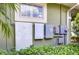 Exterior utilities featuring a Tesla Powerwall plus a back-up generator for continuous power at 22338 Bartholdi Cir, Land O Lakes, FL 34639