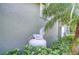 Exterior utilities feature a propane tank with lush landscaping at 22338 Bartholdi Cir, Land O Lakes, FL 34639