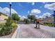 Entrance to a beautiful community through a decorative security gate at 22338 Bartholdi Cir, Land O Lakes, FL 34639