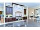 Gourmet kitchen with a large island, granite countertops, and professional-grade appliances at 22338 Bartholdi Cir, Land O Lakes, FL 34639