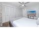 Bedroom with dual closets and a ceiling fan at 2363 Newburg Ln # B, Safety Harbor, FL 34695