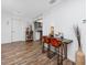 Open-concept dining area features a bar-style table, seating for two, and modern finishes at 2363 Newburg Ln # B, Safety Harbor, FL 34695