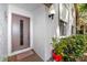 Inviting doorway entrance with decorative door and homey welcome mat at 2363 Newburg Ln # B, Safety Harbor, FL 34695