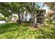 Two story building with green landscaping and exterior stairs at 2363 Newburg Ln # B, Safety Harbor, FL 34695
