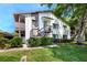 Attractive condominium with well-maintained landscaping and covered walkways at 2363 Newburg Ln # B, Safety Harbor, FL 34695