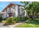Beautiful two-story building with green landscaping and private balconies at 2363 Newburg Ln # B, Safety Harbor, FL 34695
