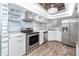 Well-equipped kitchen with modern appliances, cabinets, and tile backsplash at 2363 Newburg Ln # B, Safety Harbor, FL 34695