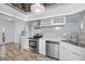Updated kitchen with stainless steel appliances and white cabinets at 2363 Newburg Ln # B, Safety Harbor, FL 34695