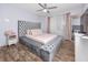 Luxurious bedroom boasts a tufted headboard, plush bedding, and a serene color palette at 2363 Newburg Ln # B, Safety Harbor, FL 34695