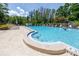Community pool featuring lounge chairs and clear blue water at 2363 Newburg Ln # B, Safety Harbor, FL 34695