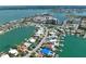 Expansive aerial view of waterfront residences, private docks, and calm canal waters in a desirable area at 25 Dolphin Dr, Treasure Island, FL 33706