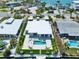 Expansive waterfront estate features a private pool and backyard oasis, with easy access to the open bay at 25 Dolphin Dr, Treasure Island, FL 33706
