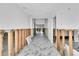 Bright hallway featuring decorative marble flooring and wall frame construction at 25 Dolphin Dr, Treasure Island, FL 33706