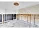Spacious living room highlighting stylish wave design wallpaper, and marble flooring at 25 Dolphin Dr, Treasure Island, FL 33706