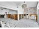 Open living room featuring recessed lights and decorative marble flooring at 25 Dolphin Dr, Treasure Island, FL 33706