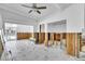 Bright living room featuring light fixture and decorative marble flooring at 25 Dolphin Dr, Treasure Island, FL 33706