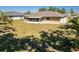 Expansive backyard with a screened lanai, perfect for outdoor entertaining and relaxation at 25337 Durango Ct, Punta Gorda, FL 33955