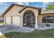 Close up of the front screened entrance showing a dolphin design on the secure front door at 25337 Durango Ct, Punta Gorda, FL 33955