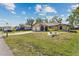 Well-maintained single-story home boasting a three-car garage, attractive landscaping and cozy entrance at 25337 Durango Ct, Punta Gorda, FL 33955