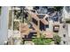 Aerial view of the home featuring solar panels, a yard, and a detached garage at 3443 16Th Ave S, St Petersburg, FL 33711
