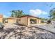 View of the backyard and detached garage, showing ample space and potential for customization at 3443 16Th Ave S, St Petersburg, FL 33711
