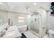 Elegant bathroom with modern soaking tub, glass-enclosed shower, and sleek marble accents at 3443 16Th Ave S, St Petersburg, FL 33711
