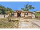 Charming single-story home featuring a decorative stone facade and well-manicured landscaping at 3443 16Th Ave S, St Petersburg, FL 33711