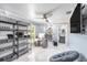 Contemporary office space with built-in storage, modern desk, and a convenient half-bathroom at 3443 16Th Ave S, St Petersburg, FL 33711