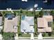 High angle shot of houses with pools and waterfront access at 4604 Blue Marlin Dr, Bradenton, FL 34208