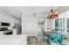 Bright kitchen featuring modern appliances, white cabinets and eat-in kitchen at 4604 Blue Marlin Dr, Bradenton, FL 34208