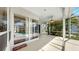 This lanai features a view of the pool through sliding glass doors, and lots of room for outdoor seating at 4604 Blue Marlin Dr, Bradenton, FL 34208