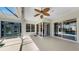 This spacious lanai offers multiple views, including a pool, backyard, and access to other living areas at 4604 Blue Marlin Dr, Bradenton, FL 34208