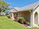 Charming single story house with well-maintained landscaping and a cozy front porch at 4851 Leyte Ct, New Port Richey, FL 34655