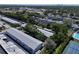 Aerial showcasing the buildings, tennis court, parking, and common areas at 5810 21St N St # 10, St Petersburg, FL 33714