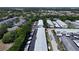 Aerial shot shows well-maintained condo buildings with parking and beautiful green landscaping at 5810 21St N St # 10, St Petersburg, FL 33714