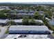 High aerial view of the neighborhood, buildings, parking and amenities at 5810 21St N St # 10, St Petersburg, FL 33714