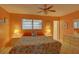 Cozy bedroom featuring a floral patterned bed, bedside tables, and dresser at 5810 21St N St # 10, St Petersburg, FL 33714