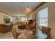 Bright living and dining area with comfortable seating, and neutral tones at 5810 21St N St # 10, St Petersburg, FL 33714
