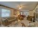 Spacious living room with comfortable seating and lots of natural light at 5810 21St N St # 10, St Petersburg, FL 33714