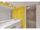 The bathroom features a vanity with a sink and a tub at 5940 Pelican Bay S Plz # 504, Gulfport, FL 33707