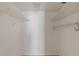 Walk-in closet featuring metal shelving and ample storage space at 5940 Pelican Bay S Plz # 504, Gulfport, FL 33707