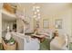 Brightly lit lobby with spiral staircase, sofas and decor at 5940 Pelican Bay S Plz # 504, Gulfport, FL 33707