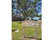 Boca Ciega Isle Mini Park with shaded trees, walking path, and waterfront views in St. Pete Beach at 600 Boca Ciega Isle Dr, St Pete Beach, FL 33706