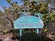 Welcome to Boca Ciega Isle sign amidst lush greenery, inviting you to explore the community at 600 Boca Ciega Isle Dr, St Pete Beach, FL 33706