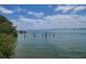 Beautiful waterfront view from the property, featuring a boat dock and tranquil waters at 600 Boca Ciega Isle Dr, St Pete Beach, FL 33706