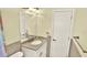 This is a clean and functional bathroom with a single sink vanity at 6035 19Th Ne St, St Petersburg, FL 33703