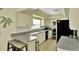Well-lit kitchen with practical countertops and stainless steel appliances at 6035 19Th Ne St, St Petersburg, FL 33703