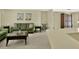 A spacious living room with comfortable seating is perfect for entertaining and features lots of natural light at 6035 19Th Ne St, St Petersburg, FL 33703