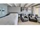 Comfortable bedroom featuring a cozy sitting area and neutral decor for a relaxing ambiance at 611 Destiny Dr # 205, Ruskin, FL 33570