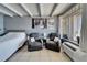 Bright bedroom with a seating area and natural light offers a relaxing retreat at 611 Destiny Dr # 205, Ruskin, FL 33570